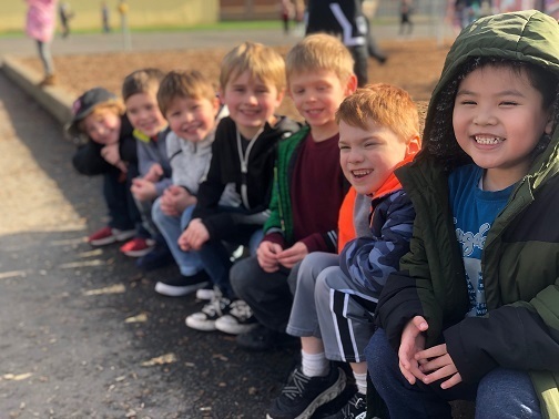 All smiles today! We love sunny day recess! 